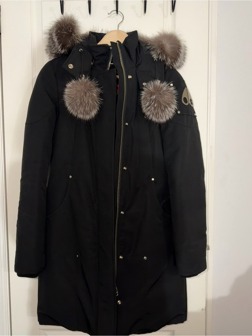 Moose Knuckles Black Parka with Taupe Fur Pom Accents